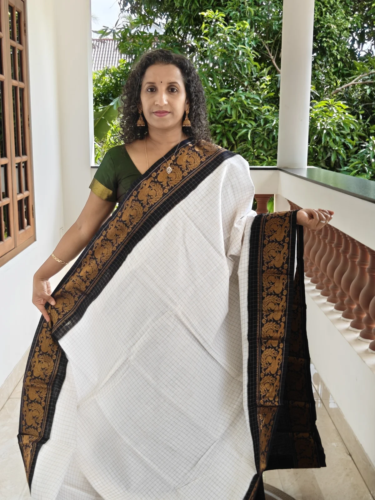 Ivory and Black Sungudi Cotton Saree with Zari Kattam and Peacock Border 