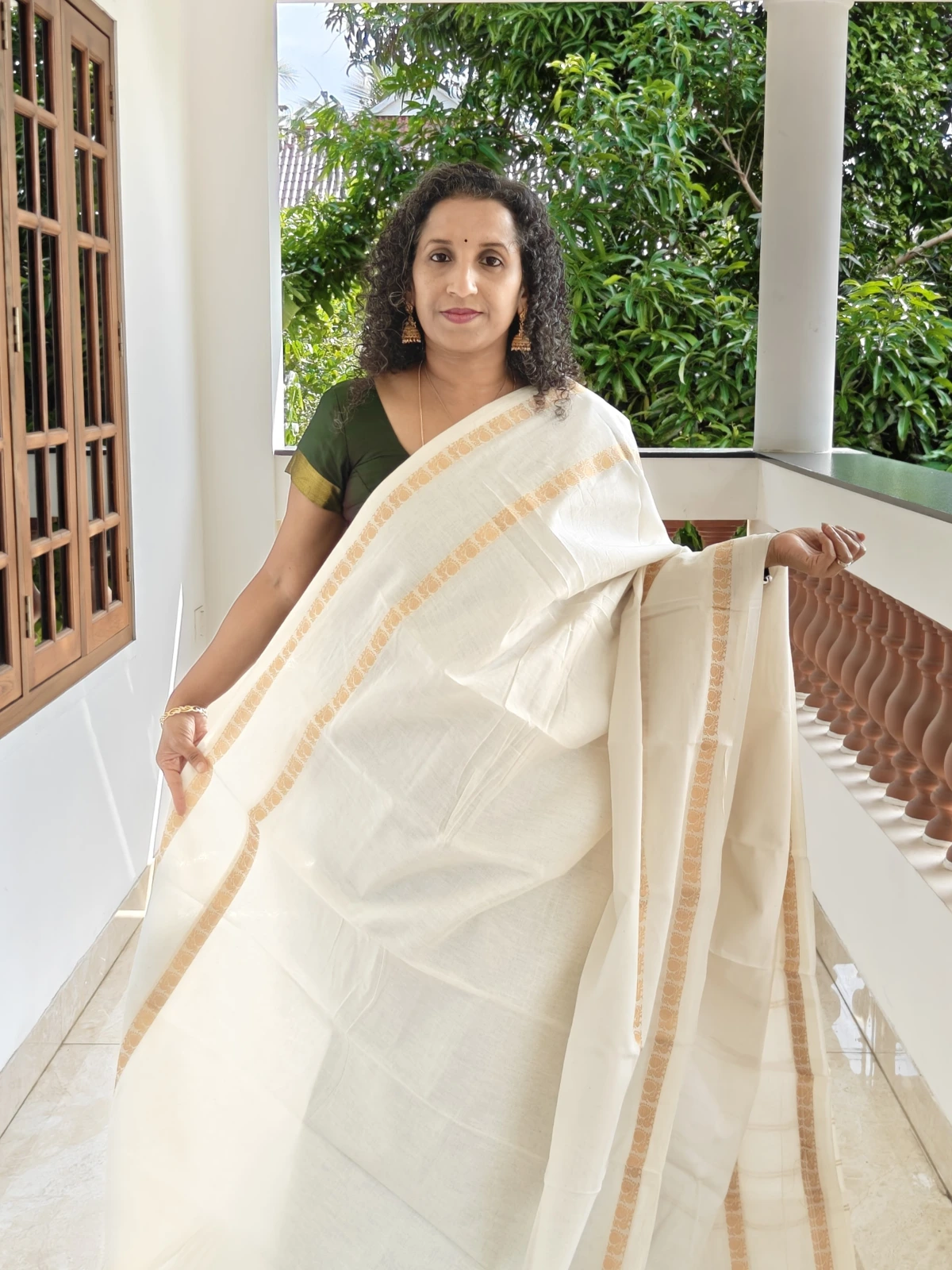 Cream Sungudi Cotton Saree with Peacock Gap Border