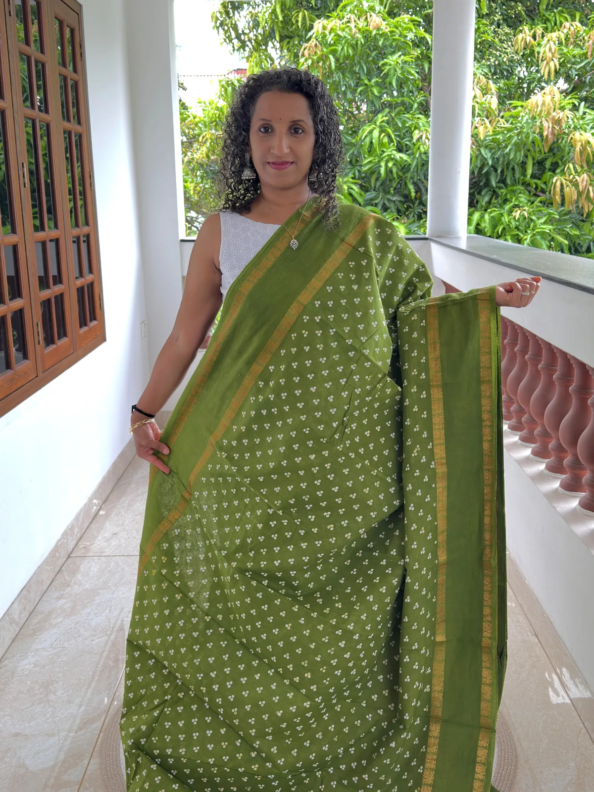 Olive Green Wax Printed Madurai Sungudi Cotton Saree with Peacock Gap Border